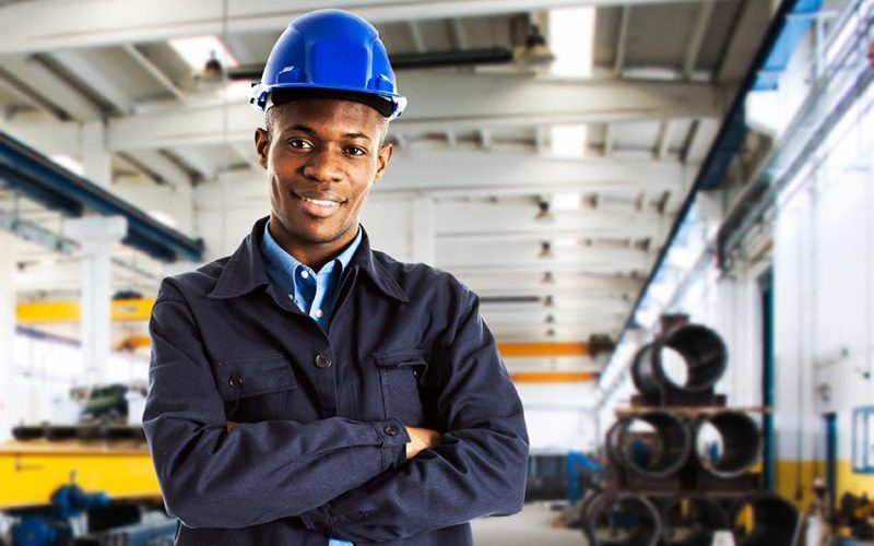 Portrait of a young smiling worker