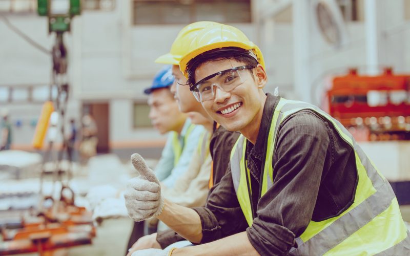 Heavy Industry Worker workman service team working in metal factory Portrait Happy smiling.